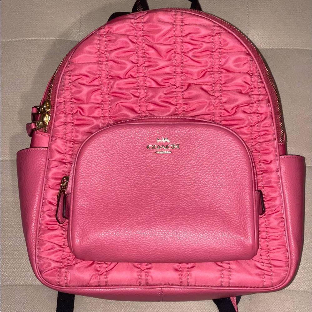 Beautiful Coach backpack, used once. Great for travel! Vibrant & compact.
